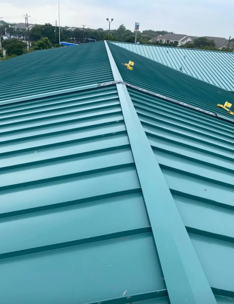 Green commercial metal roof ridge and valley for Metal Roof Repair in Zimmerman